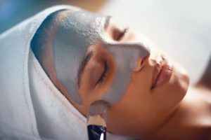 woman getting facial at a medical spa