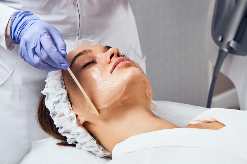 Young Lady getting Chemical Peel Treatment