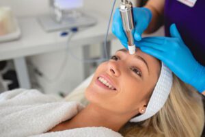 Woman sitting in a spa centre relaxing and getting skin care