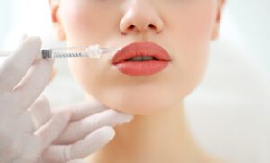 Woman receiving Lip injection