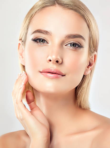 beautiful woman showing her face after Clear + Brilliant® Touch laser skin resurfacing procedure